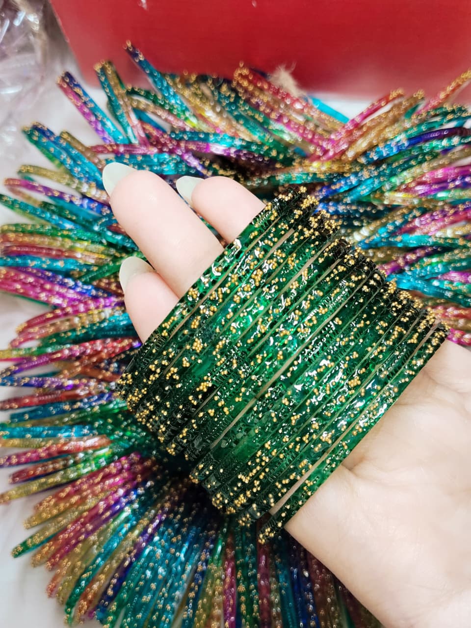 Delicate raindrops bangles that capture light with every movement