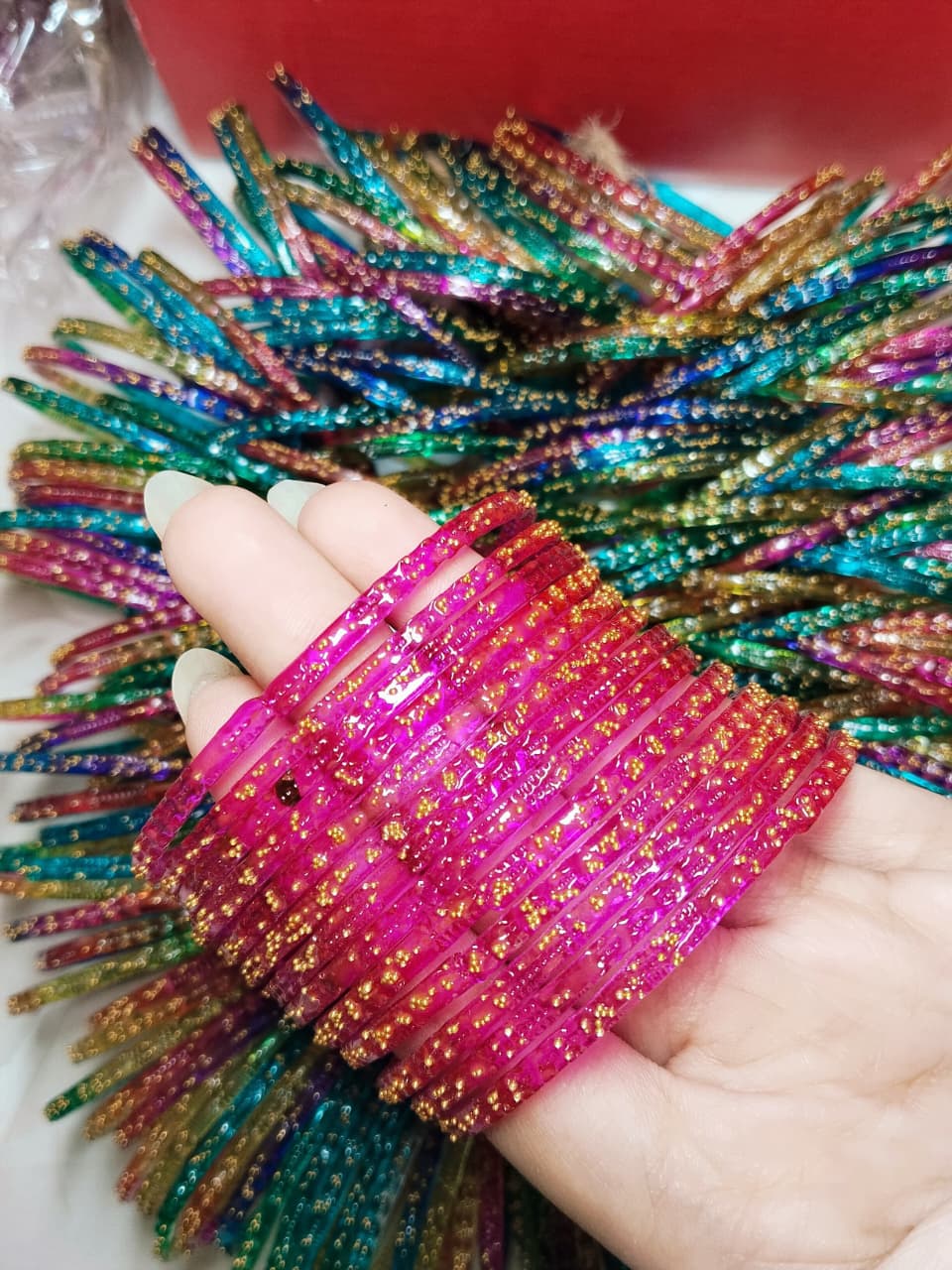 Delicate raindrops bangles that capture light with every movement