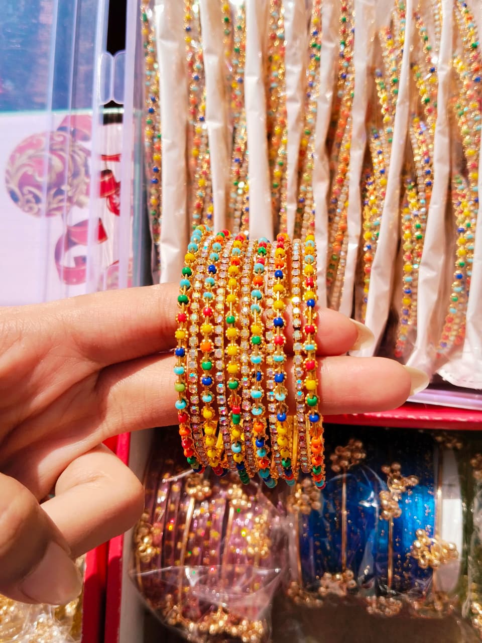 Discover the vibrant charm of traditional Indian bangles in a stunning array of colors.