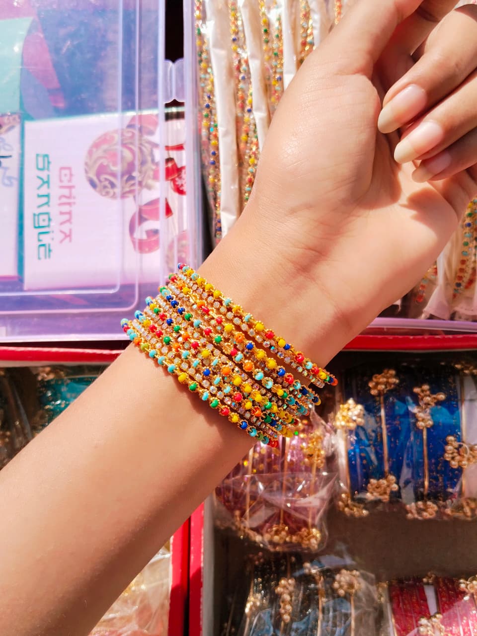Discover the vibrant charm of traditional Indian bangles in a stunning array of colors.